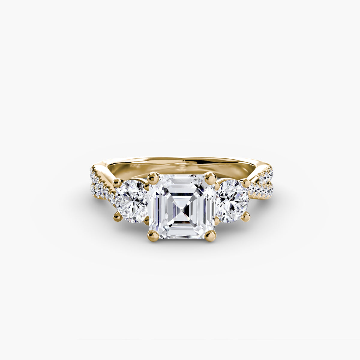 The Léonie Three-Stone with Pavé Band Setting