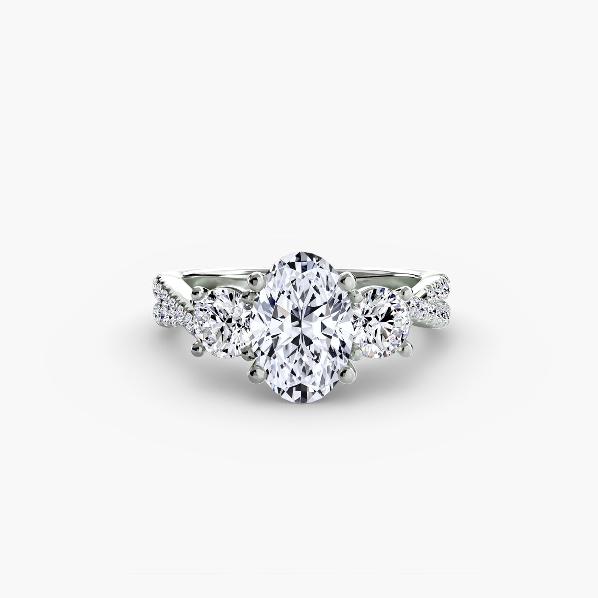 The Léonie Three-Stone with Pavé Band Setting