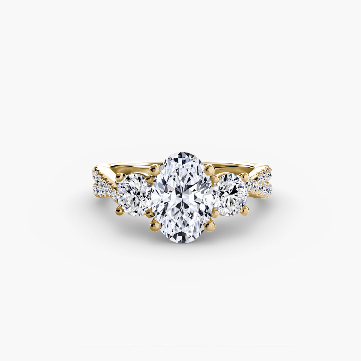 The Léonie Three-Stone with Pavé Band Setting