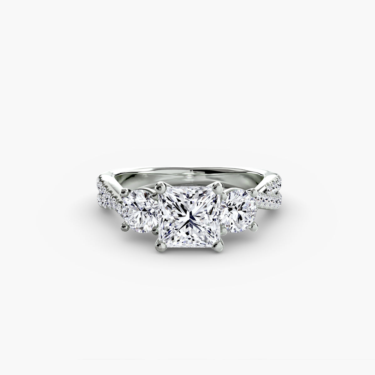 The Léonie Three-Stone with Pavé Band Setting