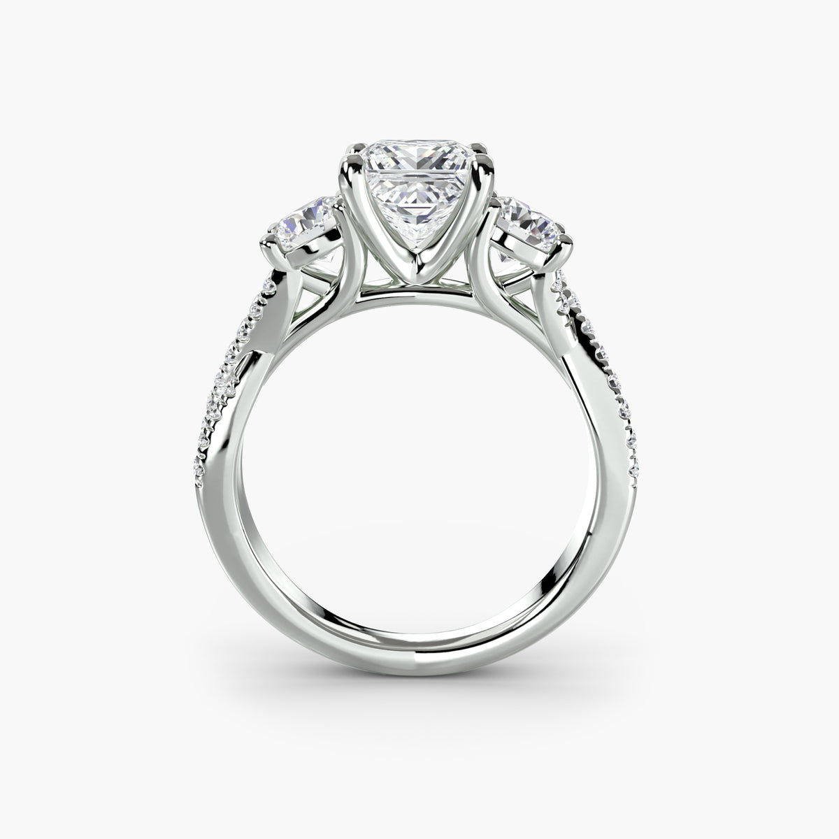 The Léonie Three-Stone with Pavé Band Setting
