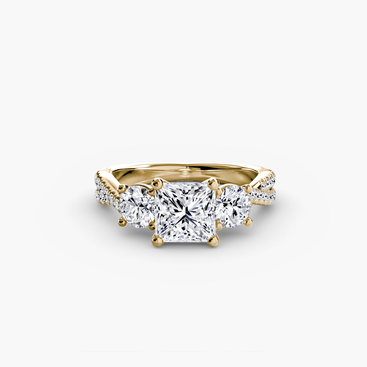 The Léonie Three-Stone with Pavé Band Setting