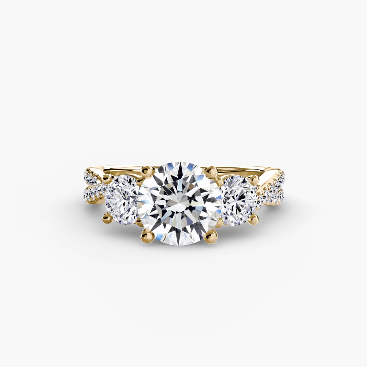 The Léonie Three-Stone with Pavé Band Setting