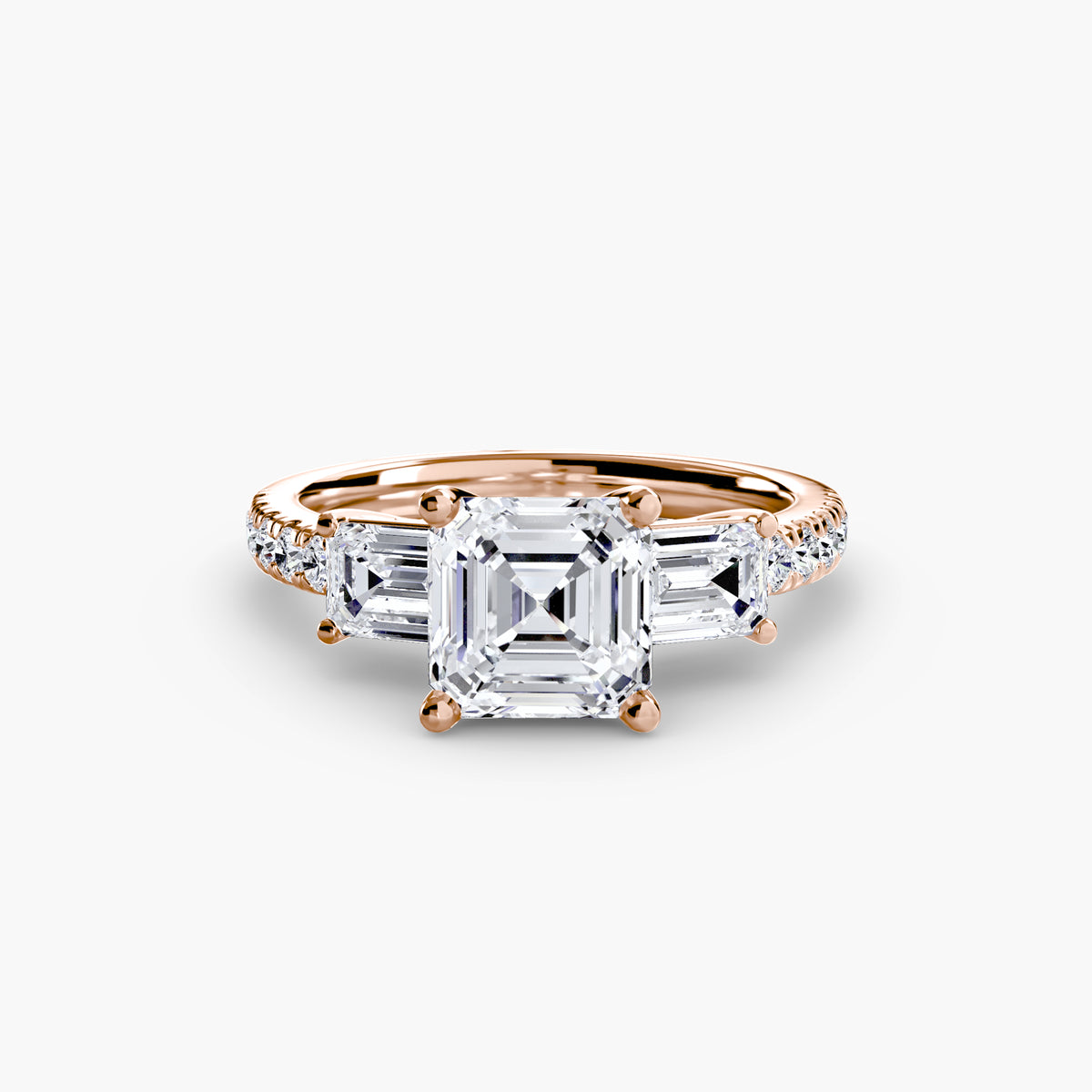 The Clara Three-Stone Ring with Pavé Band Setting