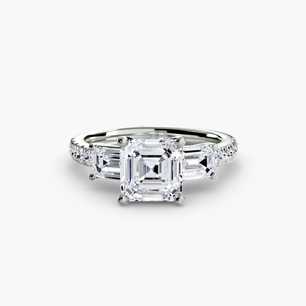 The Clara Three-Stone Ring with Pavé Band Setting