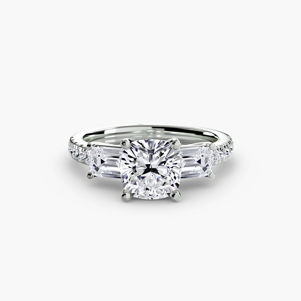 The Clara Three-Stone Ring with Pavé Band Setting