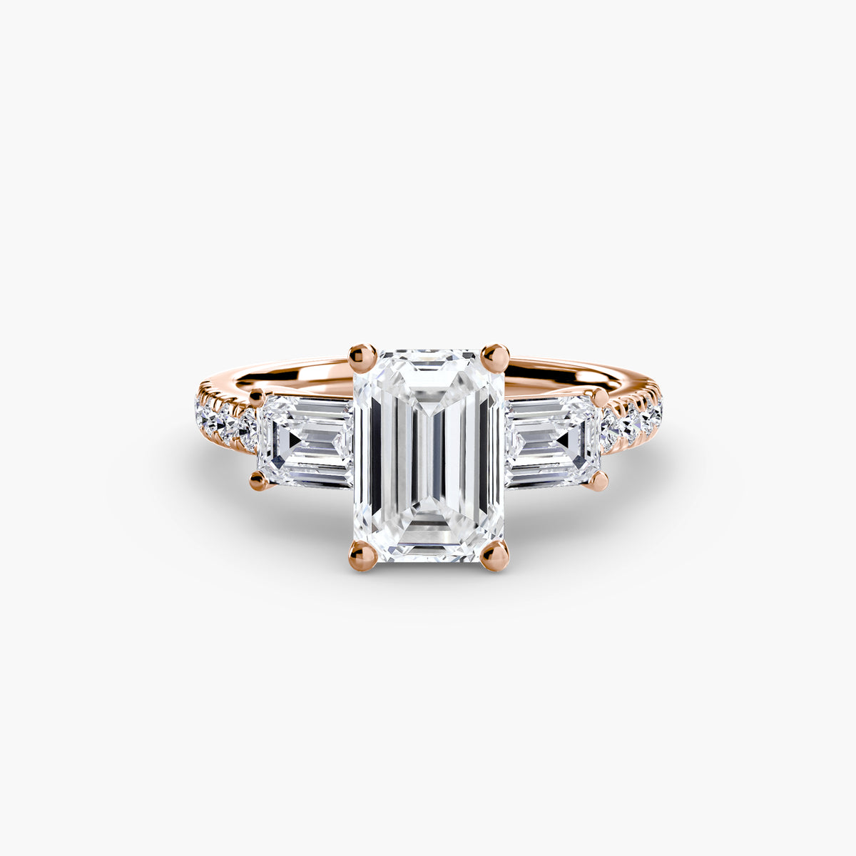 The Clara Three-Stone Ring with Pavé Band Setting