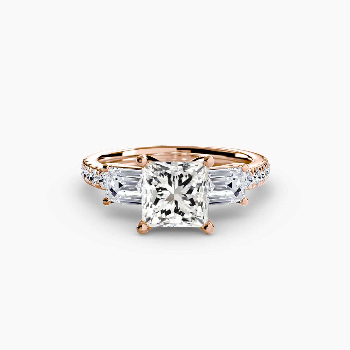 The Clara Three-Stone Ring with Pavé Band Setting