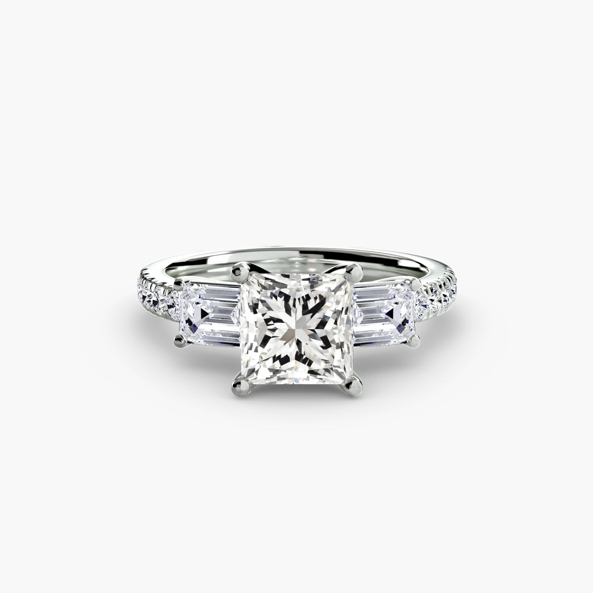 The Clara Three-Stone Ring with Pavé Band Setting