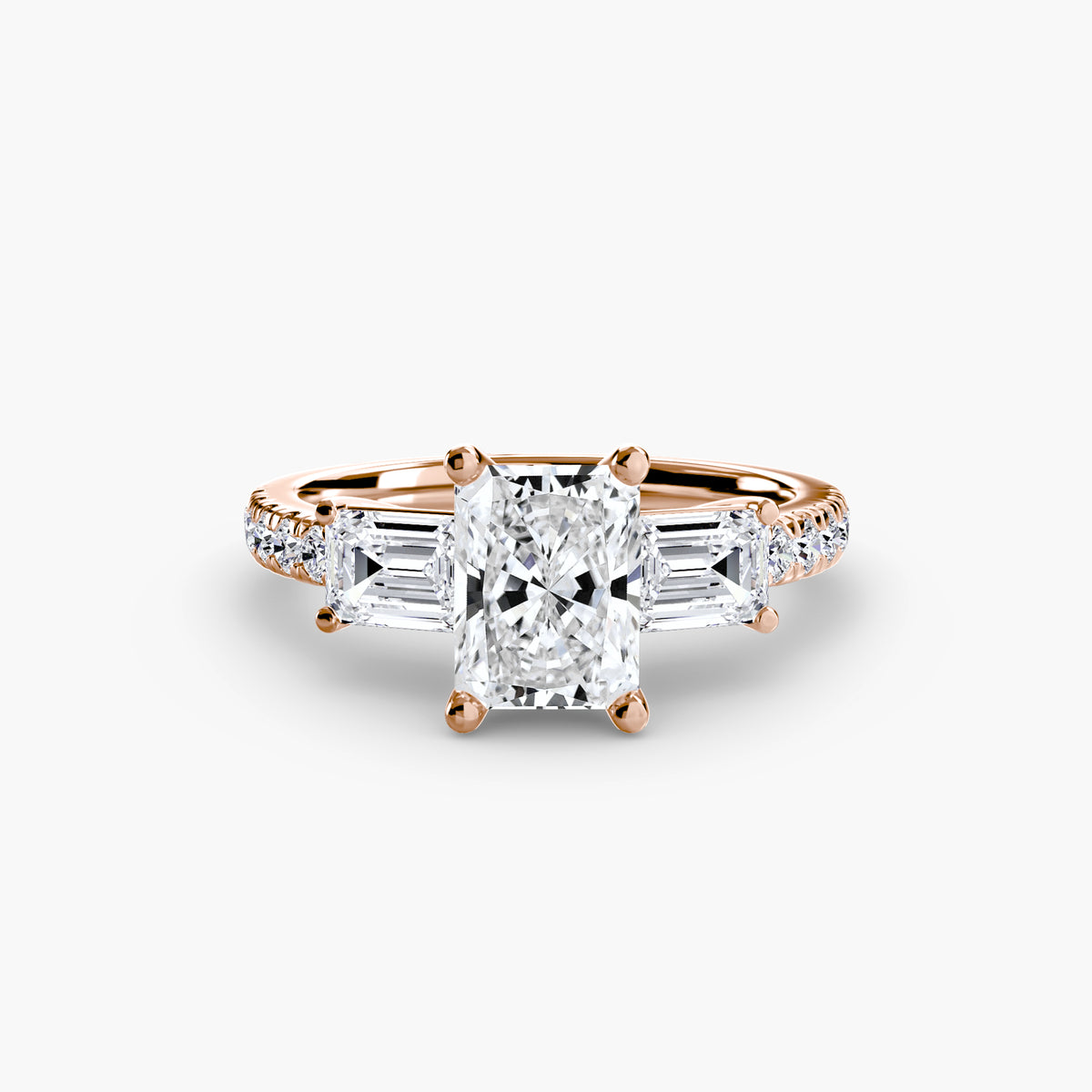 The Clara Three-Stone Ring with Pavé Band Setting