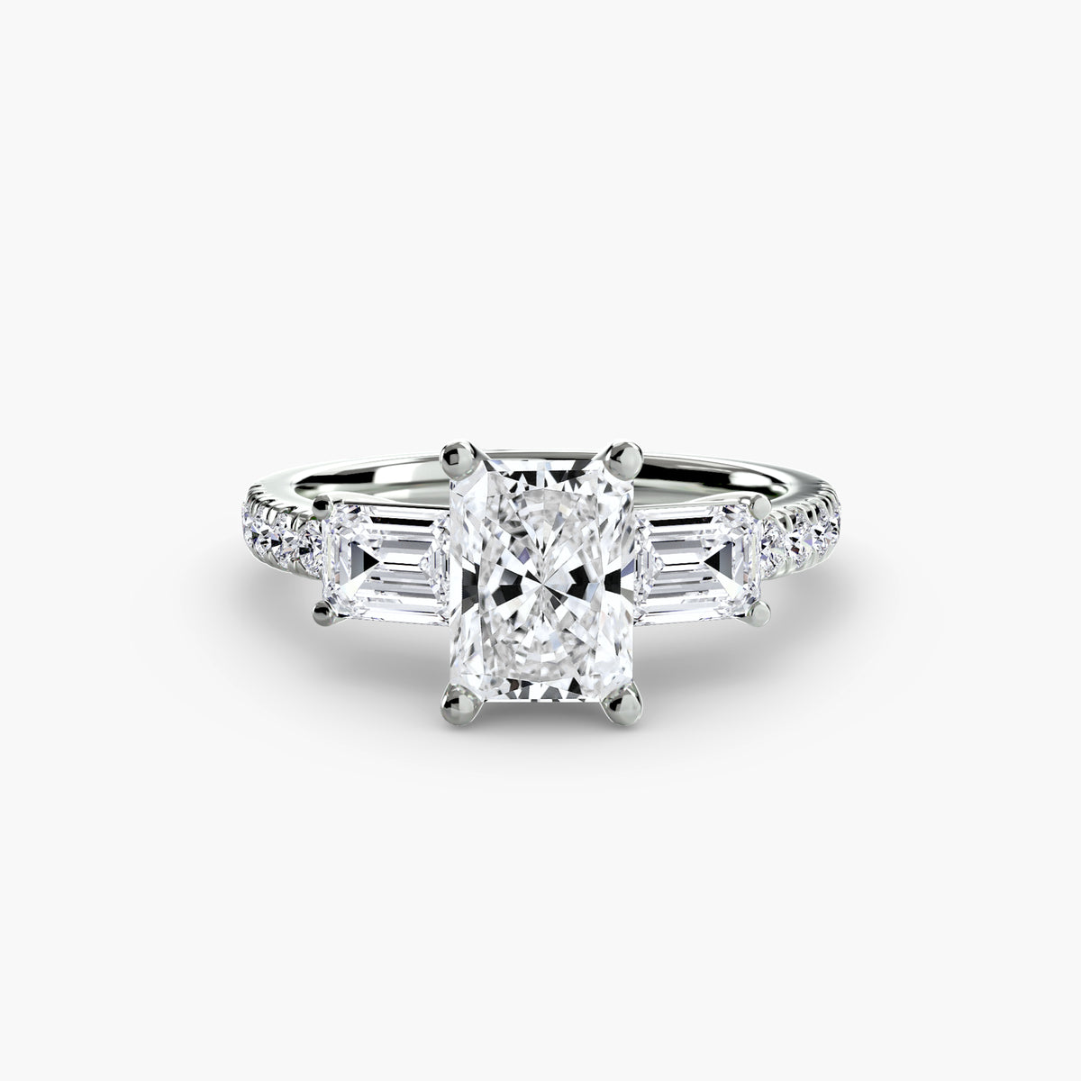 The Clara Three-Stone Ring with Pavé Band Setting