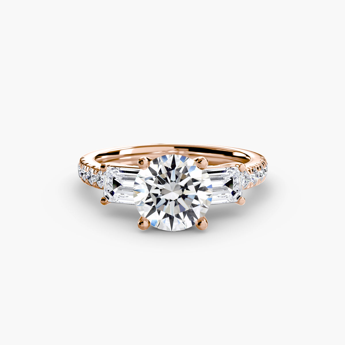The Clara Three-Stone Ring with Pavé Band Setting