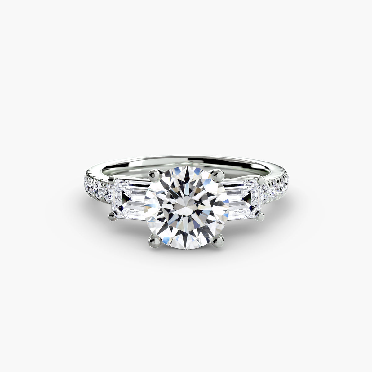 The Clara Three-Stone Ring with Pavé Band Setting