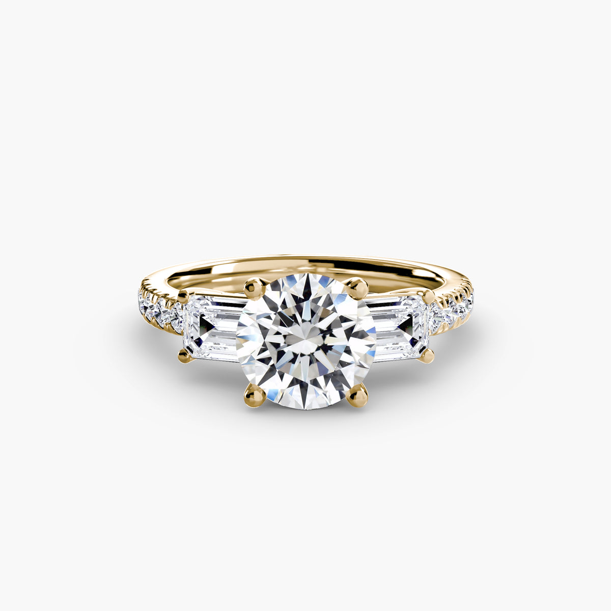 The Clara Three-Stone Ring with Pavé Band Setting