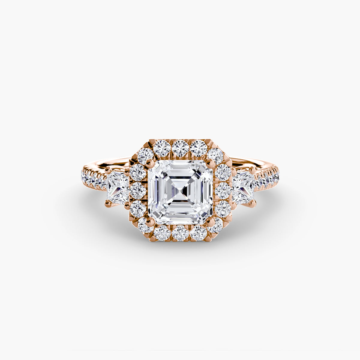 The Amélie Three-Stone Ring with Halo Setting