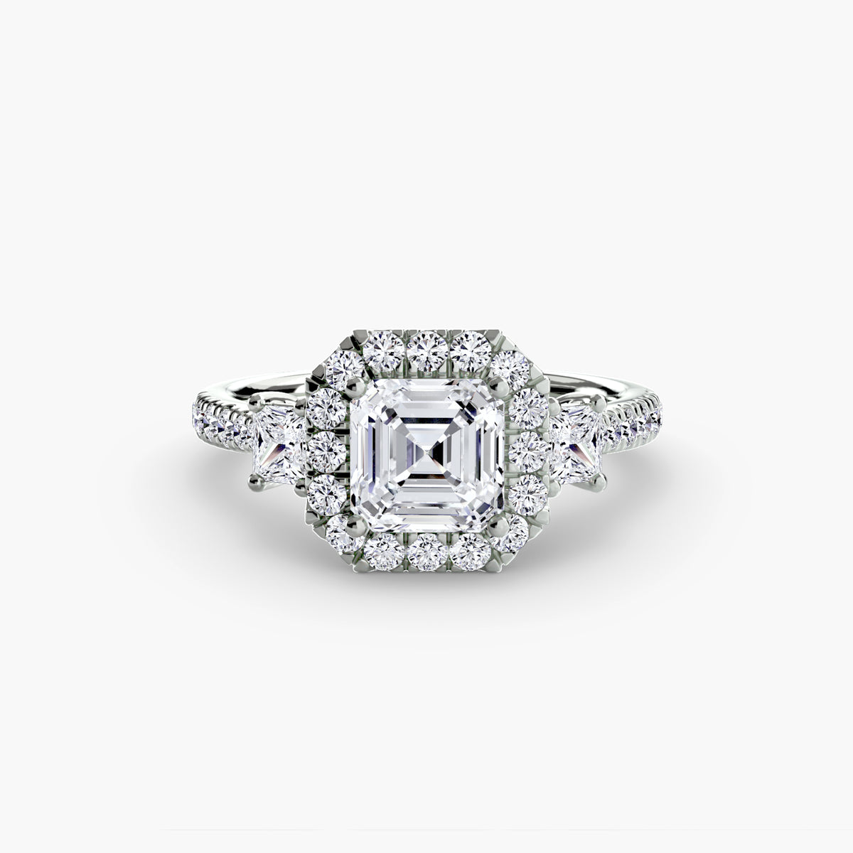 The Amélie Three-Stone Ring with Halo Setting