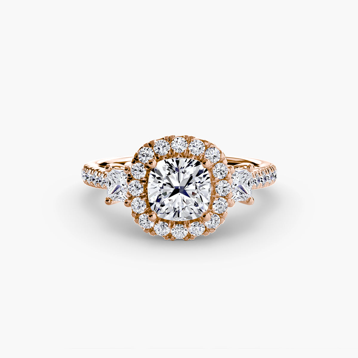 The Amélie Three-Stone Ring with Halo Setting