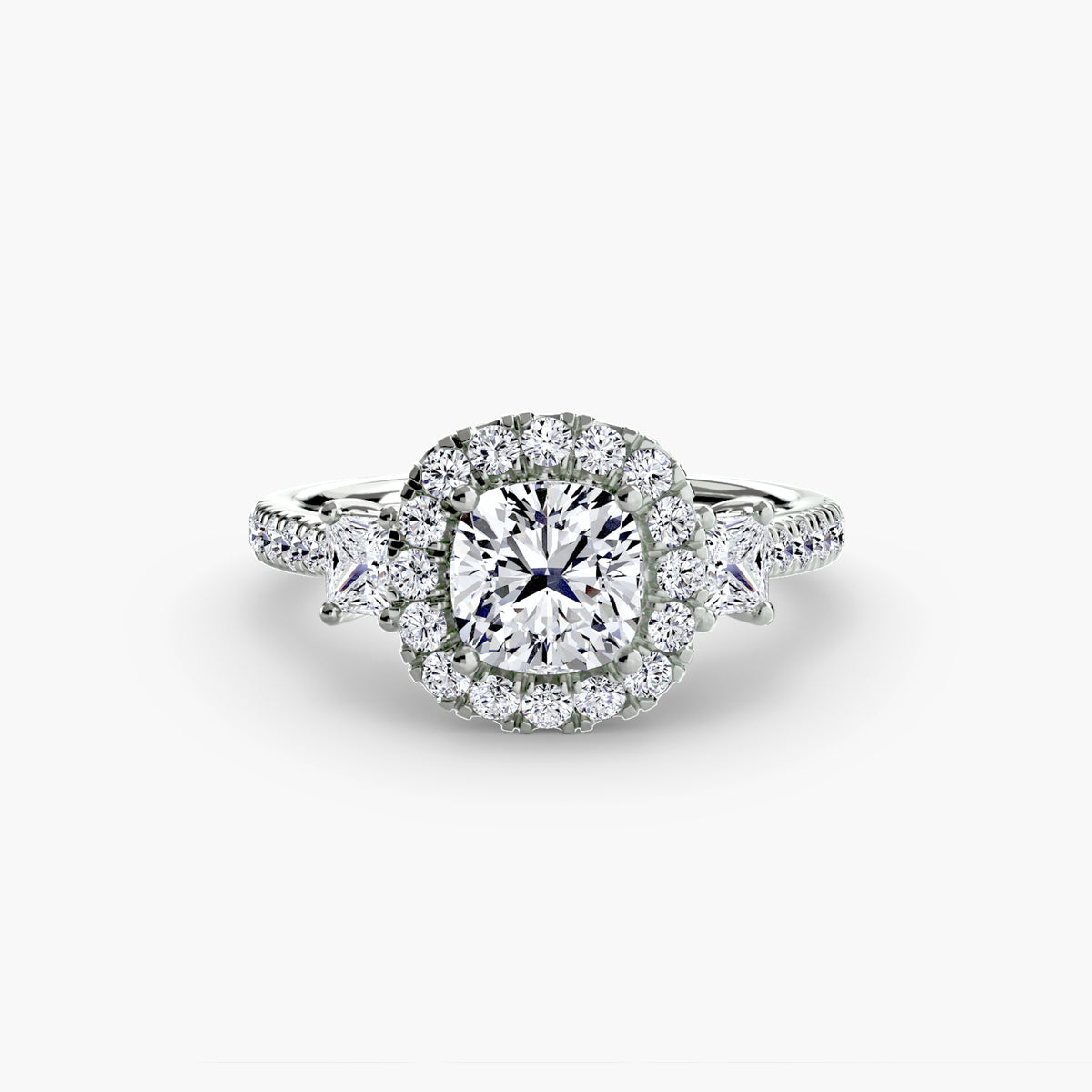 The Amélie Three-Stone Ring with Halo Setting