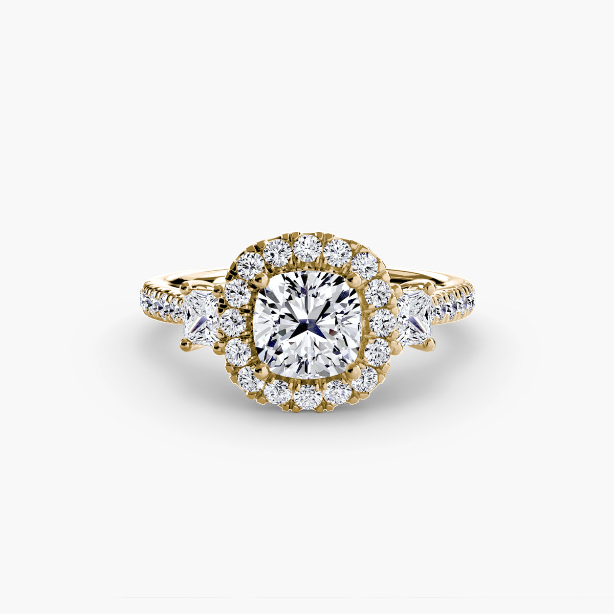 The Amélie Three-Stone Ring with Halo Setting