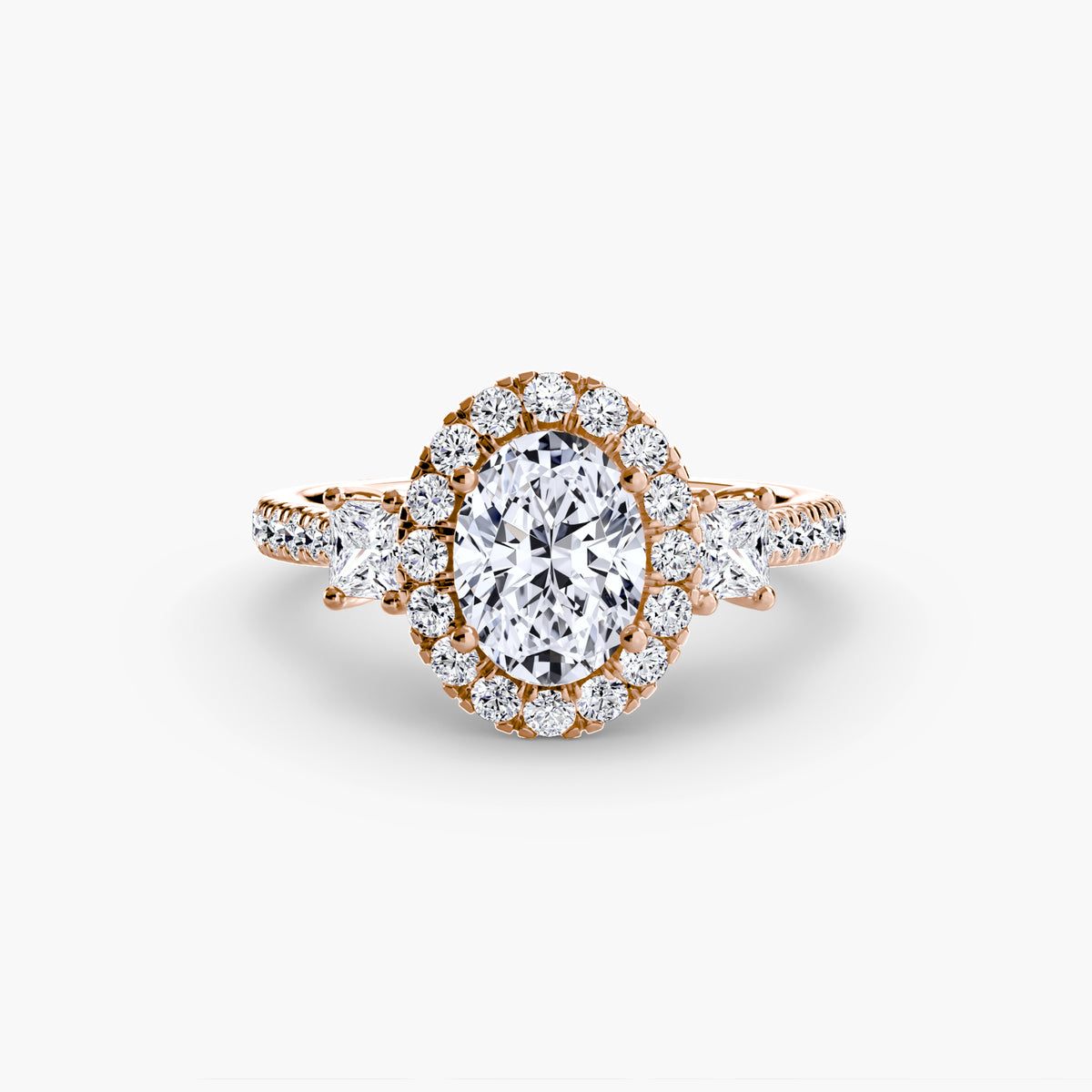 The Amélie Three-Stone Ring with Halo Setting