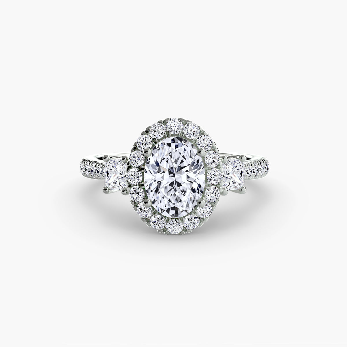 The Amélie Three-Stone Ring with Halo Setting