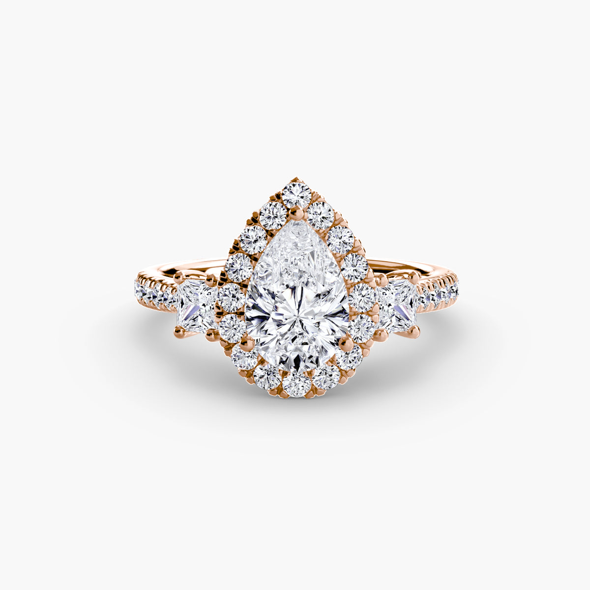The Amélie Three-Stone Ring with Halo Setting