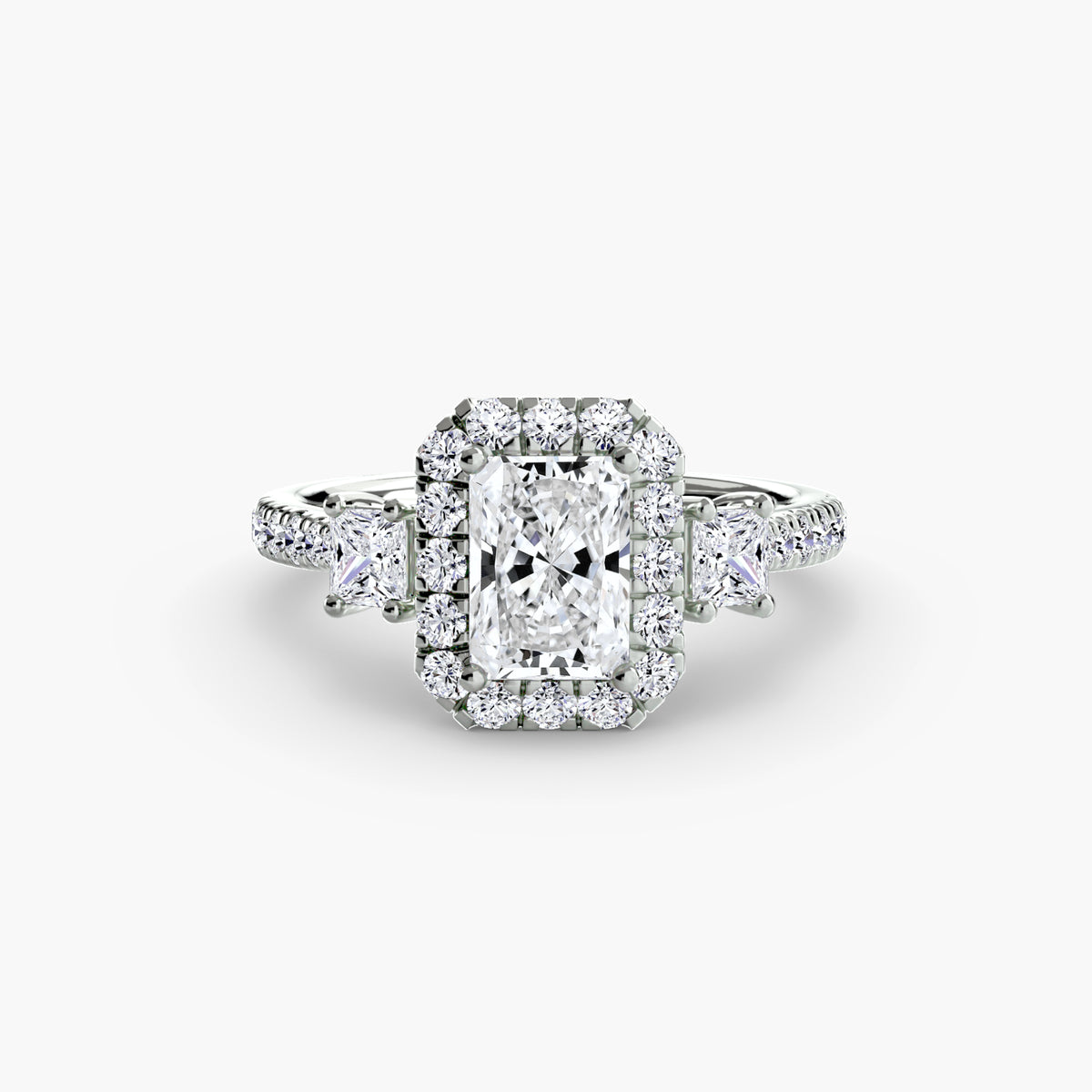 The Amélie Three-Stone Ring with Halo Setting