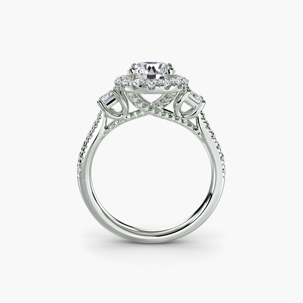 The Amélie Three-Stone Ring with Halo Setting