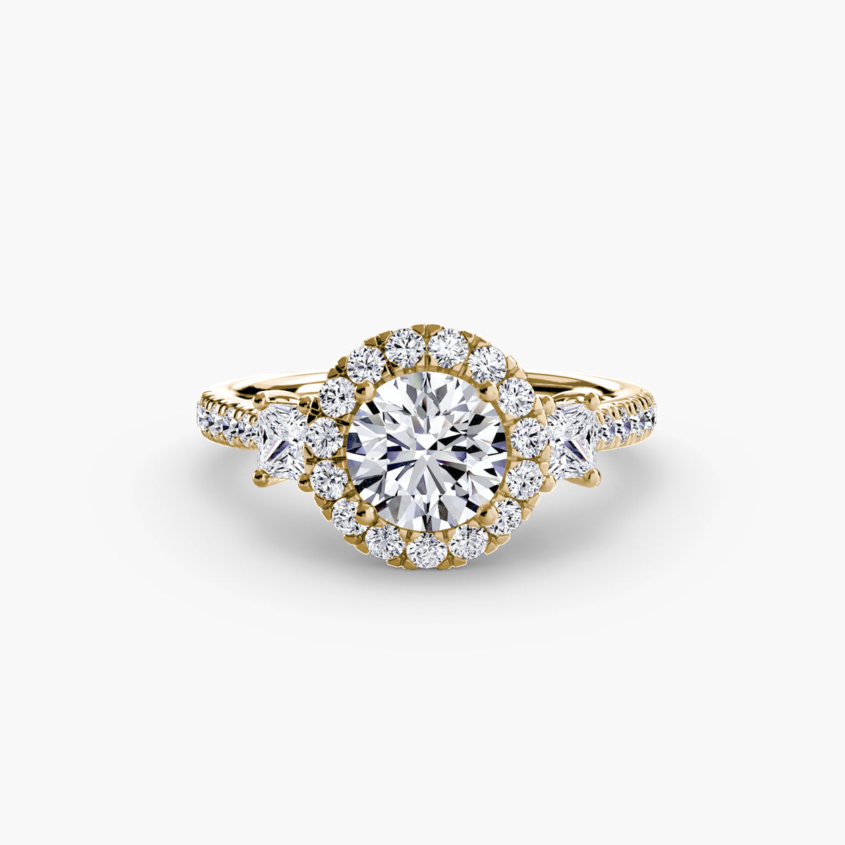 The Amélie Three-Stone Ring with Halo Setting