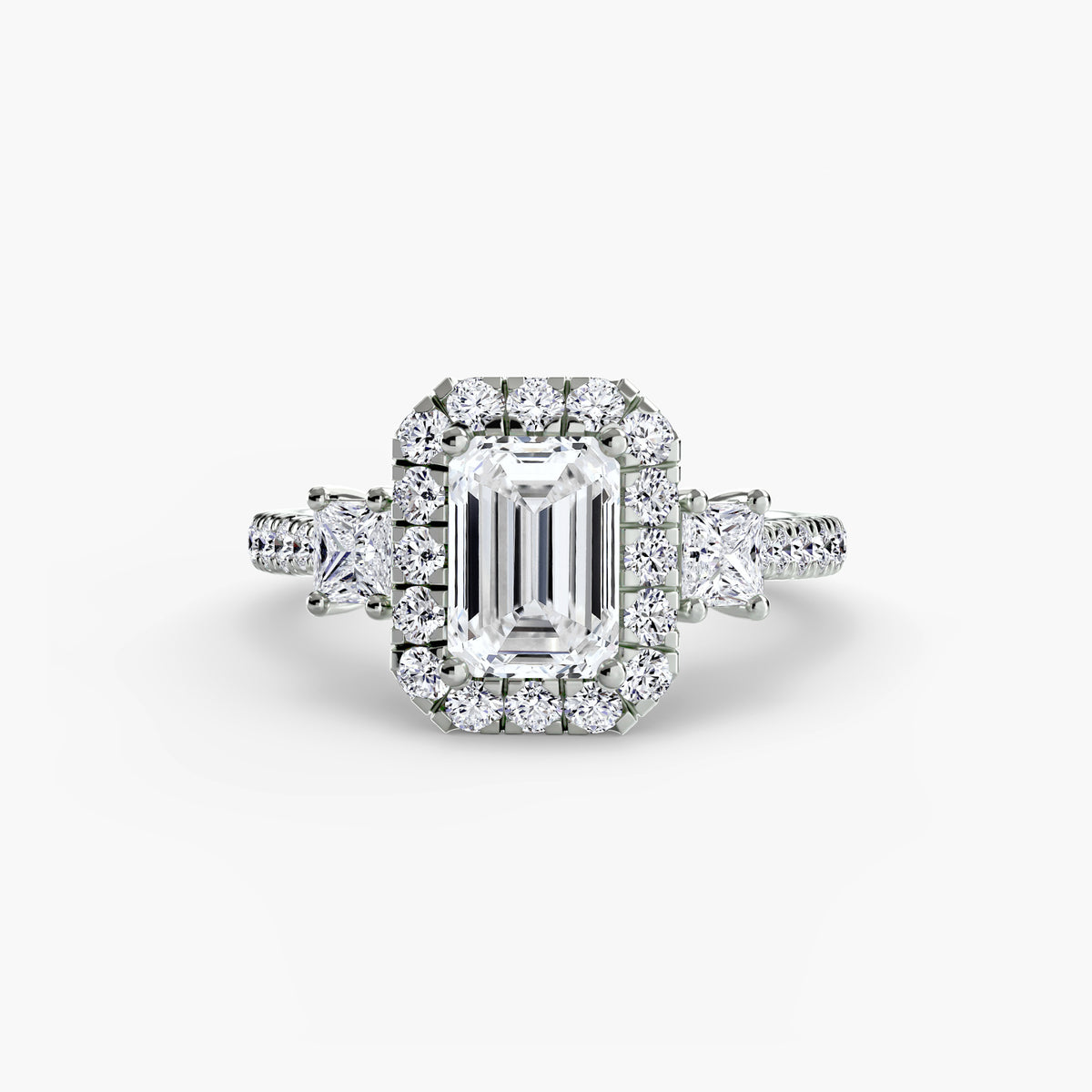 The Amélie Three-Stone Ring with Halo Setting