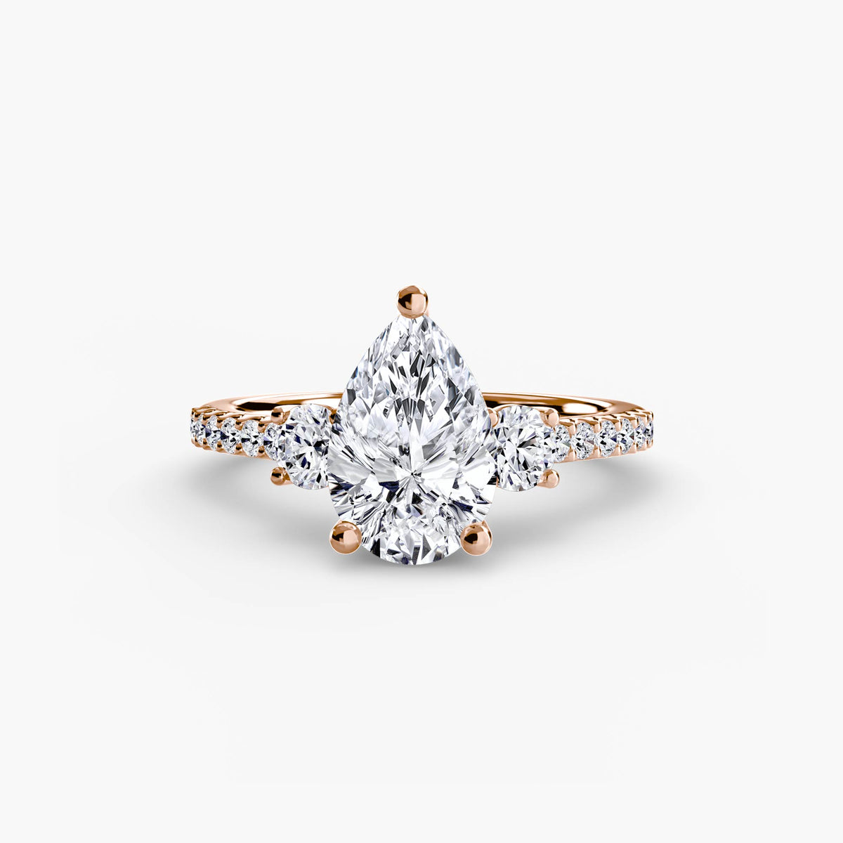 The Anaïs Three-Stone Ring with Pavé Band Setting