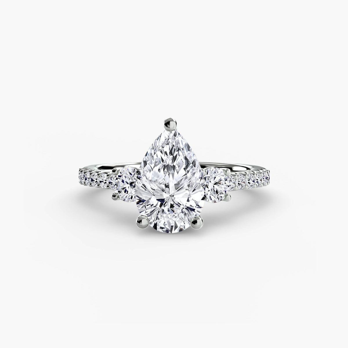 The Anaïs Three-Stone Ring with Pavé Band Setting