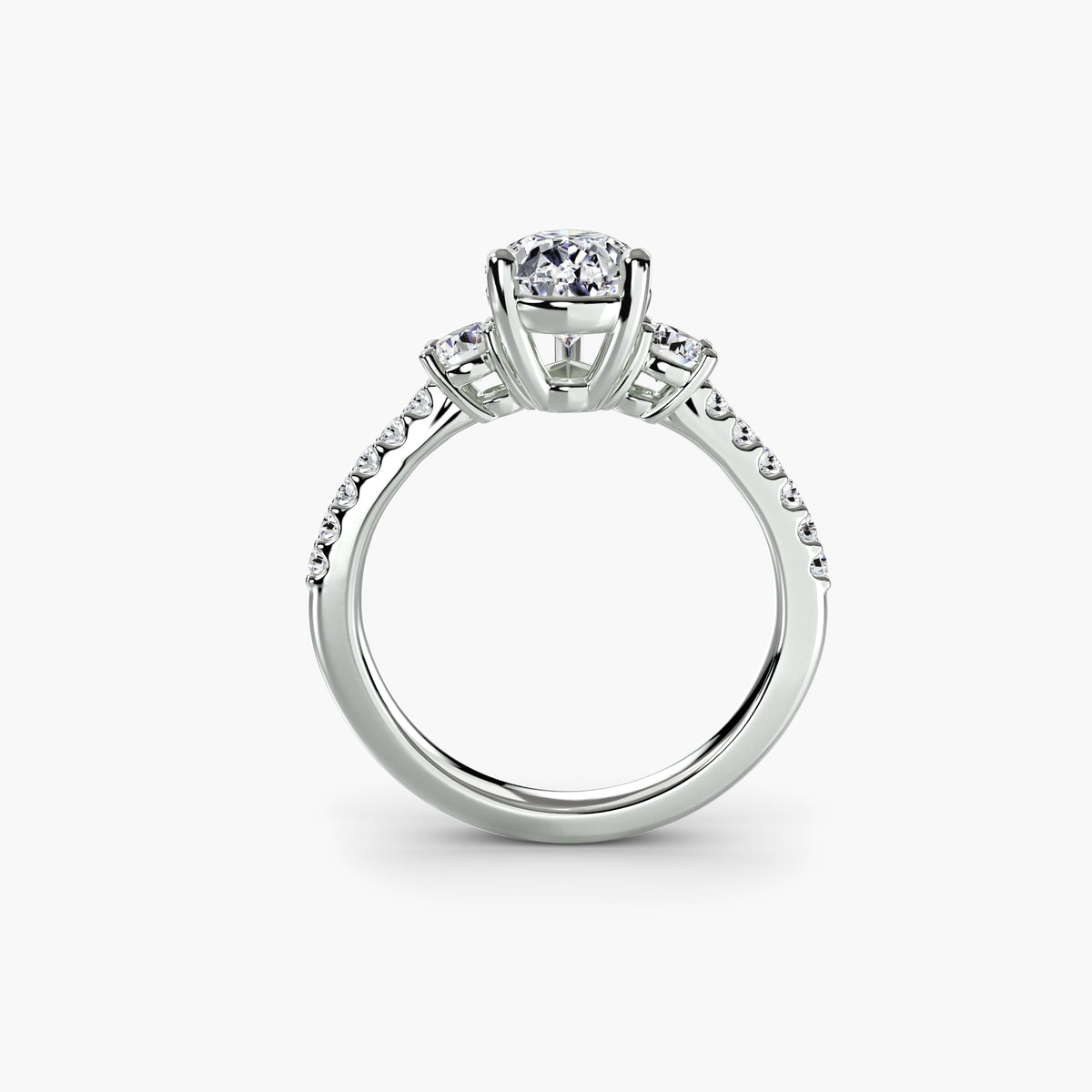 The Anaïs Three-Stone Ring with Pavé Band Setting