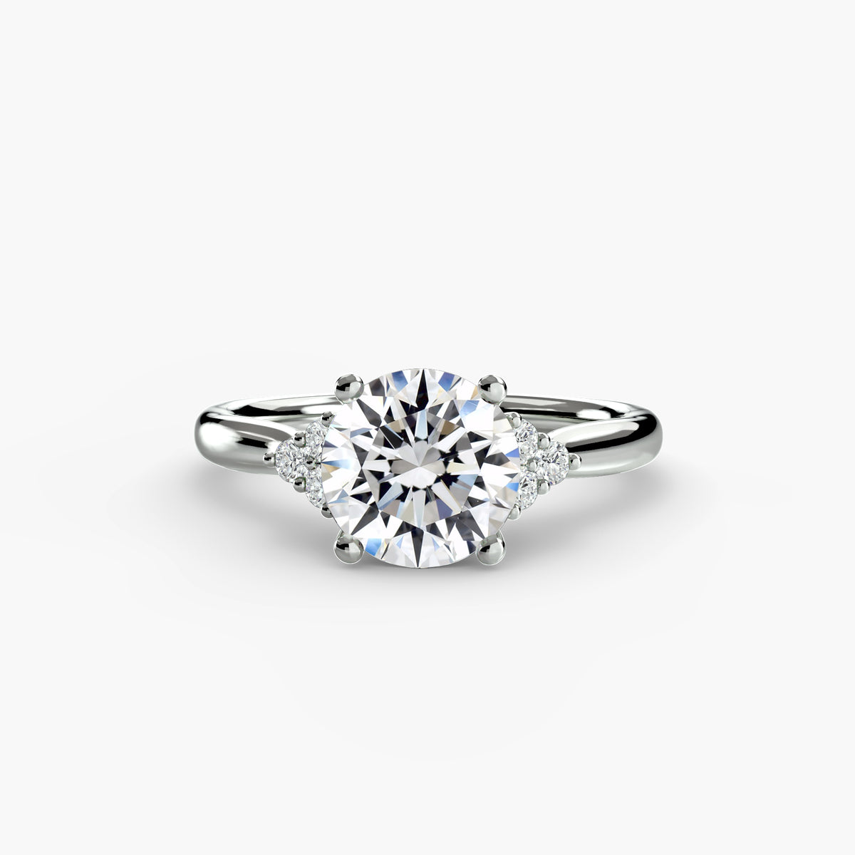 Solitaire with Cluster Shoulders Setting